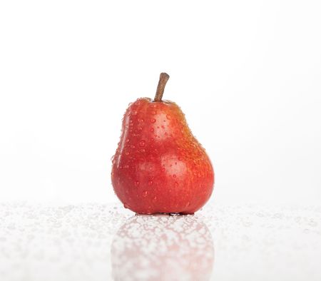 red pear with water dropsの写真素材