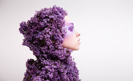 covered with  lilac beauty girl portraitの写真素材