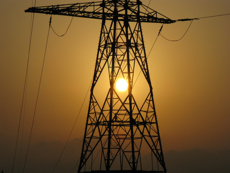 Transmission / power tower at sunsetの写真素材