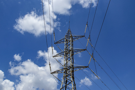 Power transmission tower on blue sky backgroundの写真素材