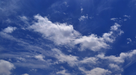 Blue sky and clouds backgroundの写真素材