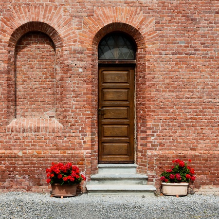Old narrow door in Italyの写真素材
