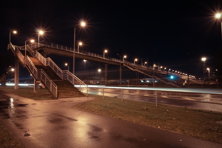 Railroad bridge at nightの写真素材
