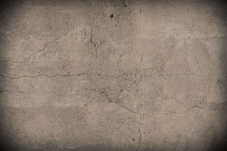 Cracked vintage vignette concrete wall textureの写真素材