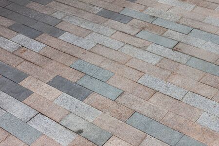Cobblestone pavement road diagonal viewの写真素材