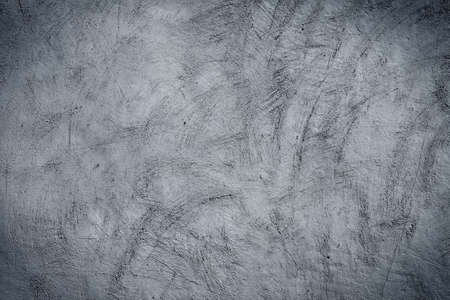 Cool brushed plaster concrete wall wallpaper backgroundの写真素材