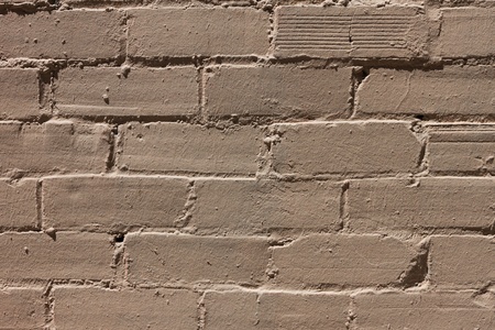 Yellow paint brick wall background patternの写真素材