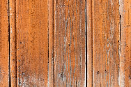 Weathered painted pattern wooden wall backgroundの写真素材