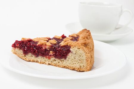 Slice of raspberry jam tart, italian homemade crostata over whiteの写真素材