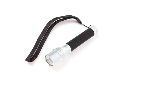 Black metal flashlight with a strap on white backgroundの写真素材