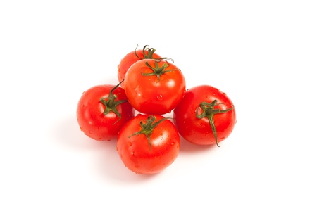 Tomatoes isolated on white backgroundの写真素材