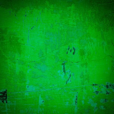 Green damaged plaster background wallの写真素材