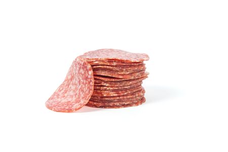 slices of salami isolated on a white backgroundの写真素材