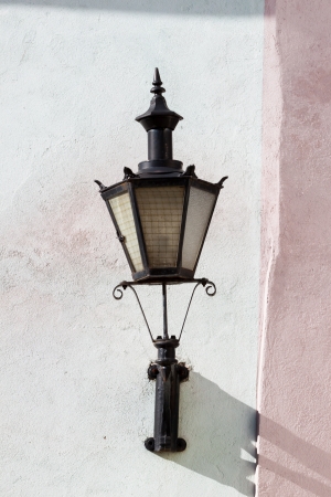 old lantern on wall in street of Tallin old town, Estoniaの写真素材