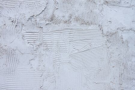 Background made with a texture of a plaster wallの写真素材