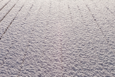 Snow-covered wood terrace floor backgroundの写真素材