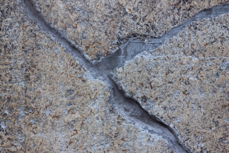 texture of old stone wall with a crack (for background)