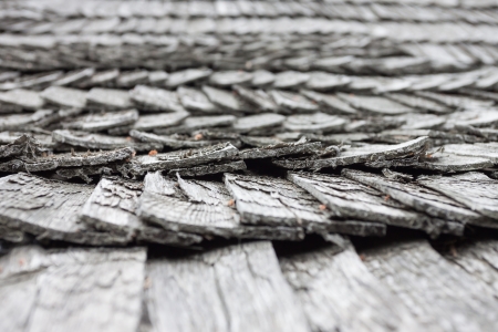 old worn wooden shingle roof pattern - close upの写真素材