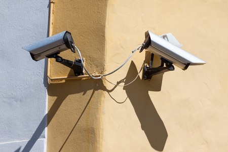 Security cameras on the old wallの写真素材