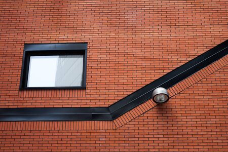 lantern on the red tiles wallの写真素材