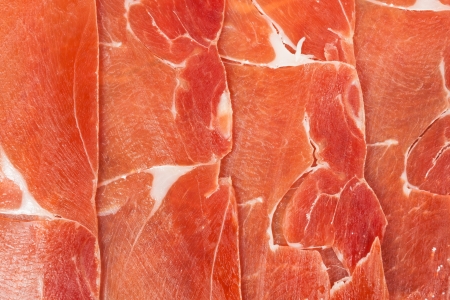 Red ham sliced as a backgroundの写真素材