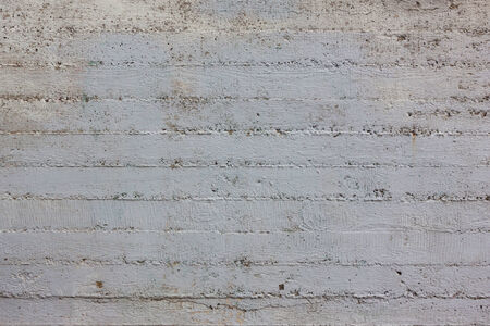 Simple striped gray concrete wall backgroundの写真素材
