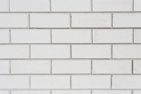 White brick wall. Seamless photo background texture