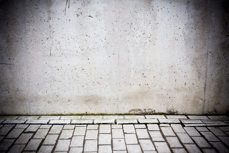 Grungy concrete wall and stone floor room as backgroundの写真素材
