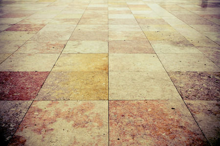 Granite square texture background with dark edgesの写真素材