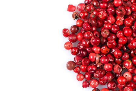 Pepper red peppercorns isolated on white backgroundの写真素材