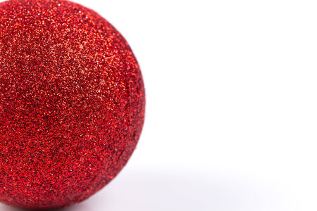 Red christmas ball isolated on white backgroundの写真素材