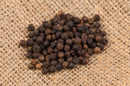 black pepper peas on sacking material backgroundの写真素材
