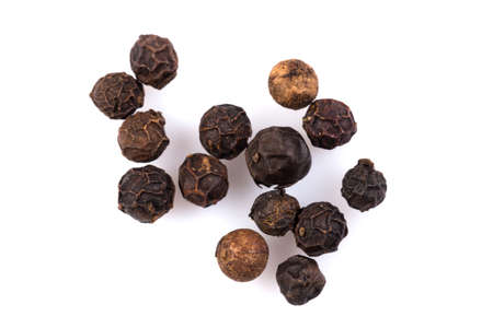 Heap of black pepper isolated on white backgroundの写真素材