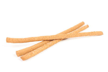 Whole wheat breadsticks isolated on white background