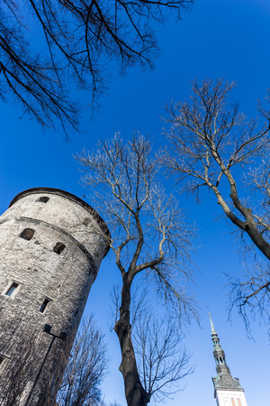 View of fortress towers and church on sky background. Tallinn. Estoniaの写真素材