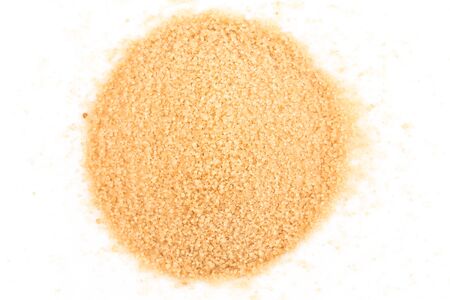 Crystals cane sugar isolated on white backgroundの写真素材