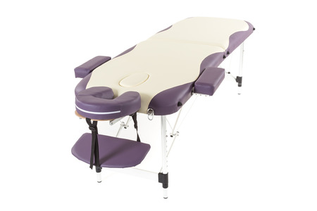 massage bed table under the white backgroundの写真素材