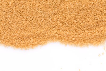 Crystals cane sugar isolated on white backgroundの写真素材