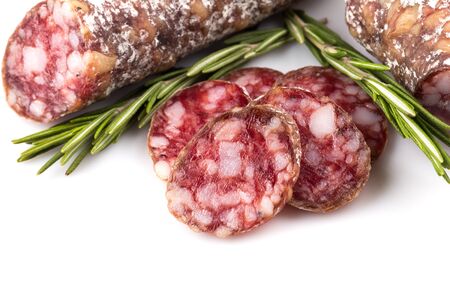 slices of salami isolated on a white backgroundの写真素材
