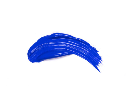 blue stroke of the paint brush on white paperの写真素材