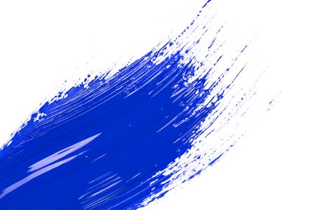blue stroke of the paint brush on white paperの写真素材