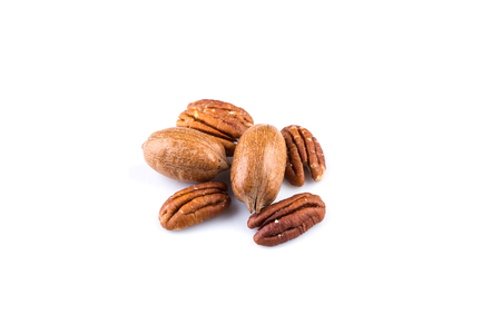 Few pecan nuts isolated on white backgroundの写真素材