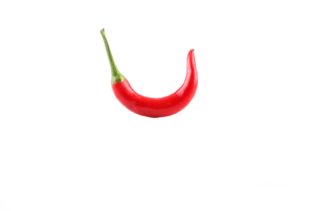 Red chili pepper isolated on a white backgroundの写真素材