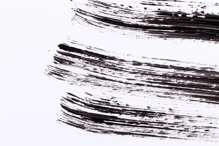 Black paint isolated on white paper backgroundの写真素材