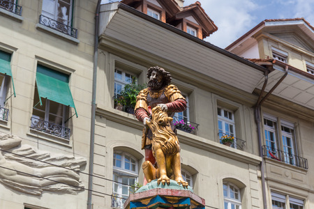 slaying the lion, 16th century traditional colourful fountains & statues in the old city of Bern, Switzerlandの写真素材