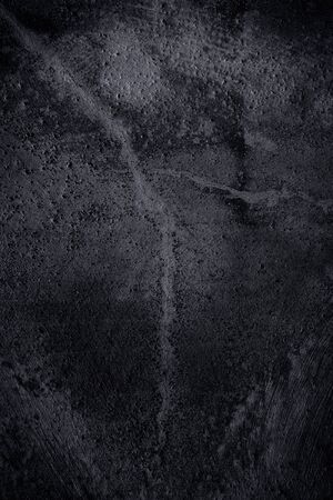 black wall scratched grungy - textured backgroundの写真素材