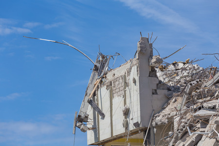 Pieces of Metal and Stone are Crumbling from Demolished