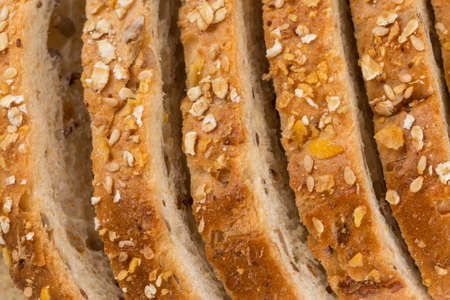 Slices of whole wheat bread close up shotの写真素材