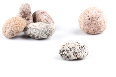 Granite stone isolated over the white backgroundの写真素材