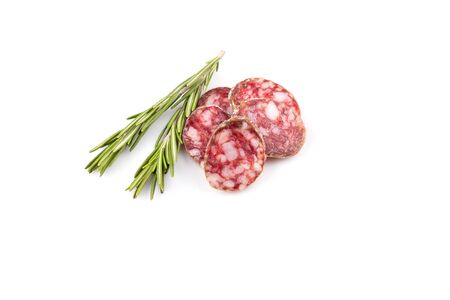 slices of salami isolated on a white backgroundの写真素材